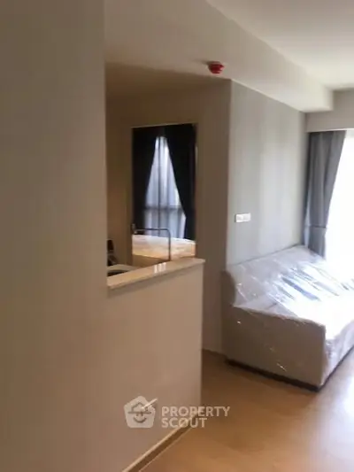 Modern apartment interior with cozy living room and natural light