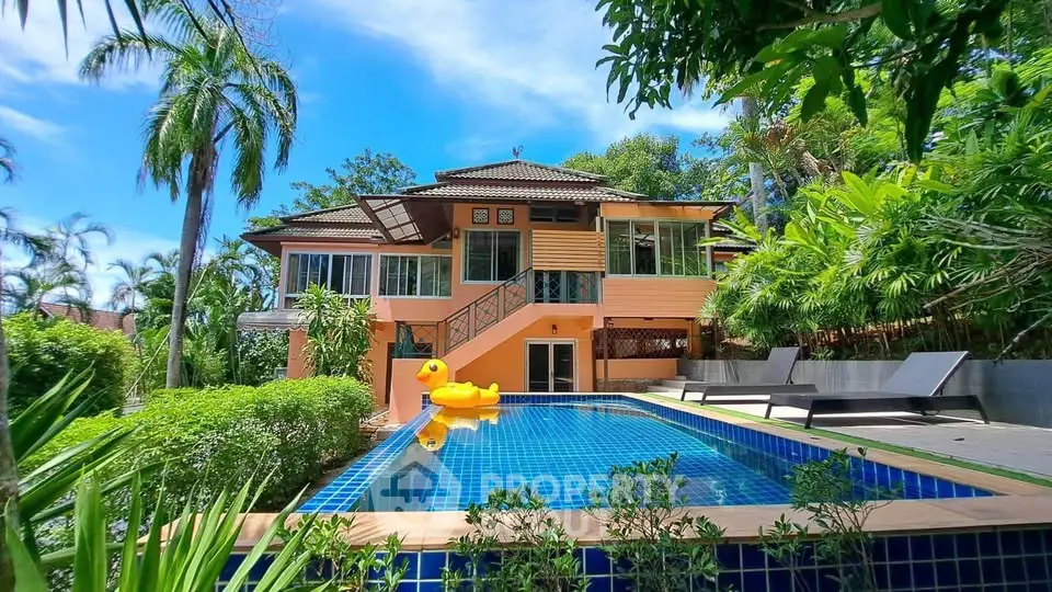 Stunning tropical villa with private pool and lush garden, perfect for luxury living.