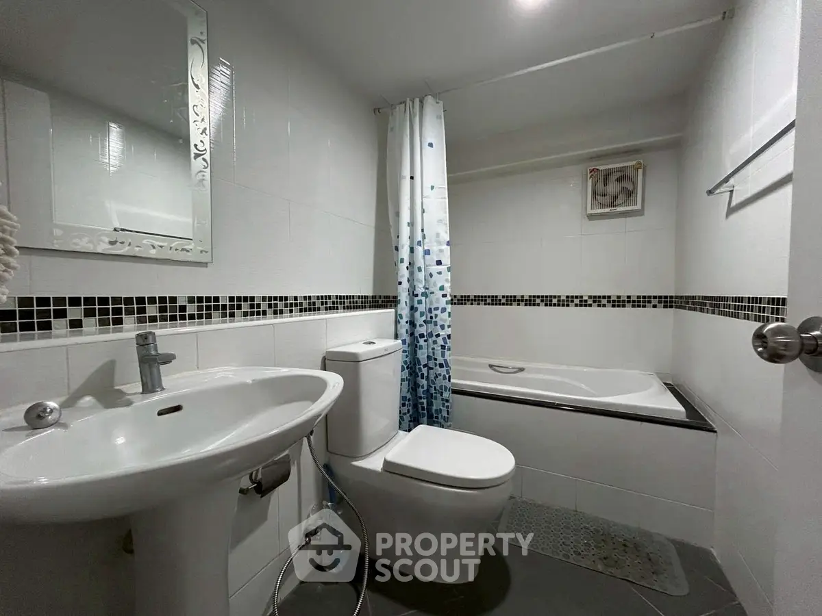 Modern bathroom with bathtub and stylish decor