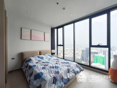 Modern bedroom with panoramic city view and stylish decor