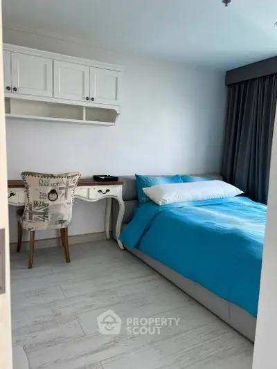 Charming bedroom with stylish decor and cozy ambiance, perfect for relaxation and comfort.