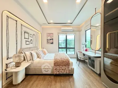 Luxurious bedroom with modern decor, large window, and elegant furnishings in a stylish apartment.