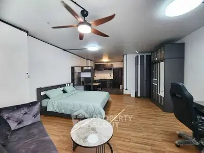 Spacious studio apartment with modern furnishings and open layout