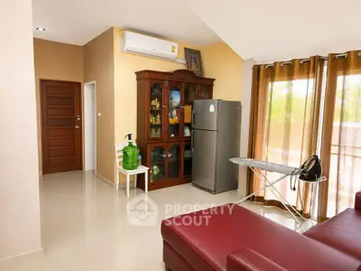 Spacious living room with modern furniture and natural light