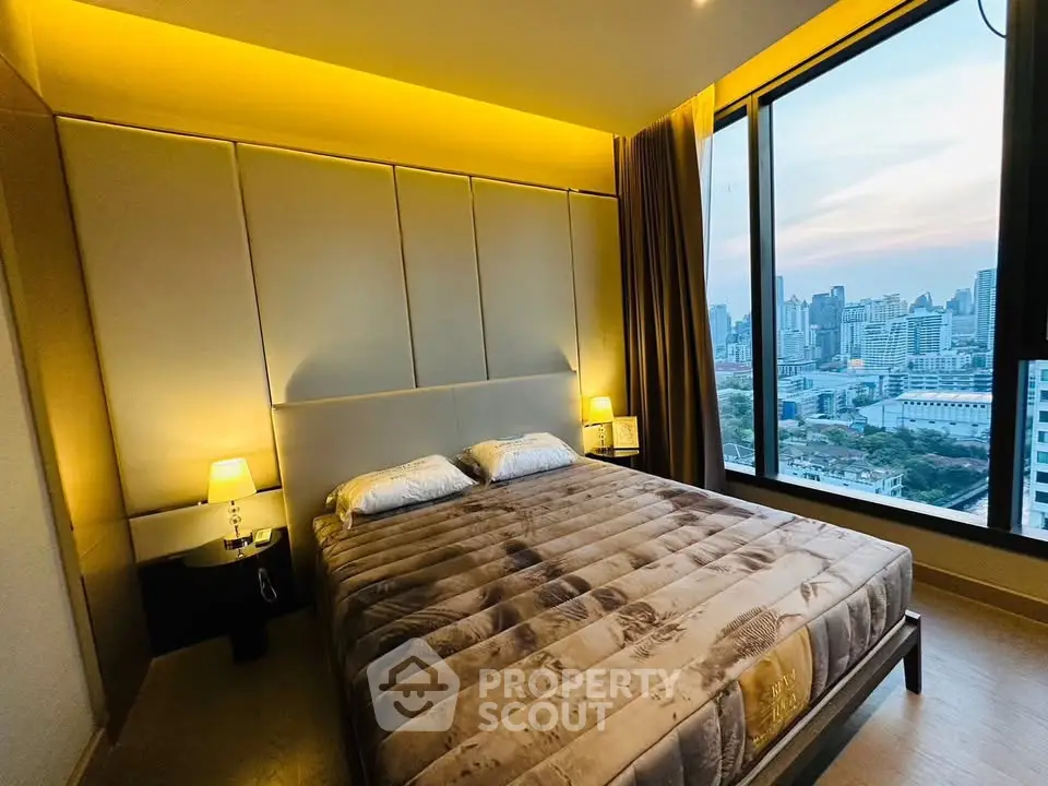 Luxurious bedroom with stunning city view and ambient lighting
