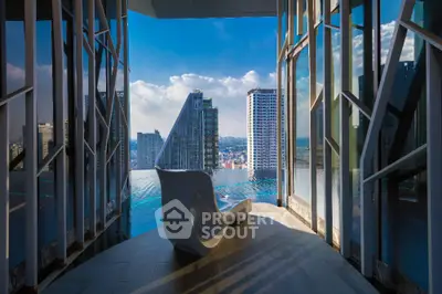 Stunning high-rise balcony with panoramic city views and modern architectural design.