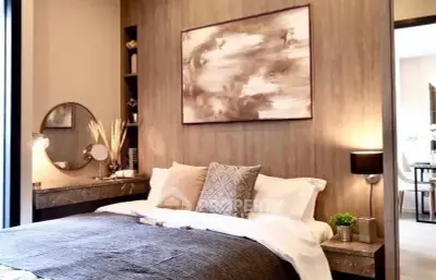 Luxurious bedroom with modern decor and elegant lighting, perfect for relaxation and comfort.