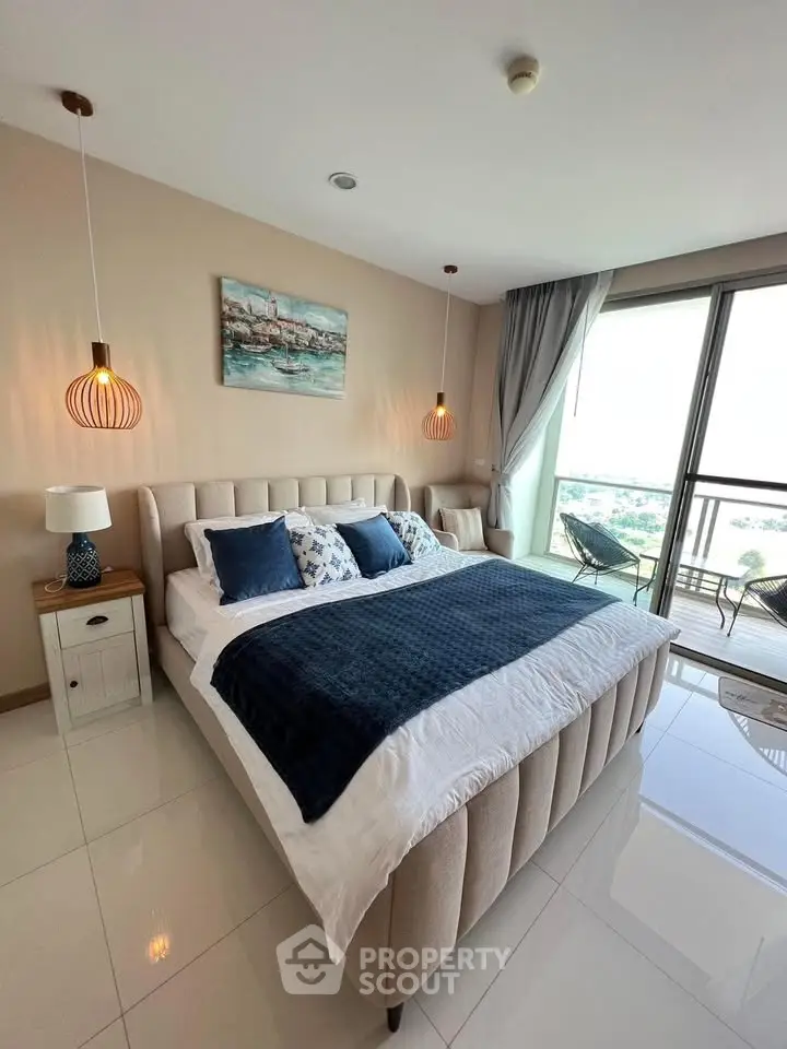 Luxurious bedroom with elegant decor and balcony view in modern apartment