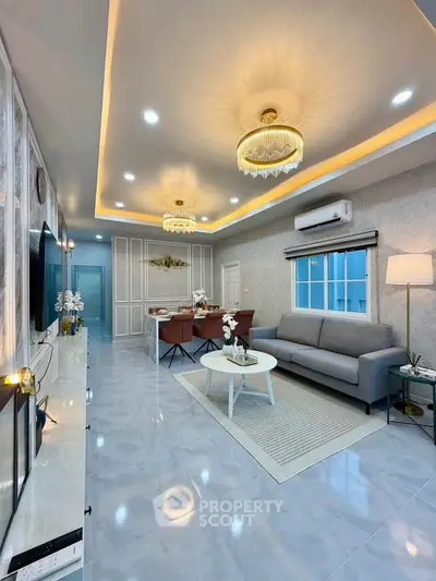 Luxurious modern living room with elegant lighting and stylish decor