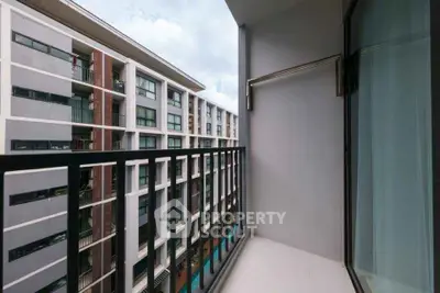 Modern apartment balcony with city view, perfect for relaxation and enjoying the urban lifestyle.