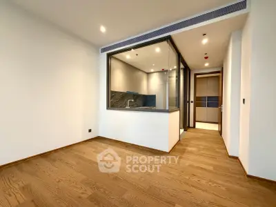 Modern apartment interior with open layout and wooden flooring