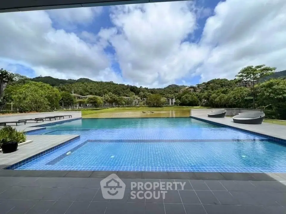 Luxurious pool with stunning mountain views and serene surroundings.