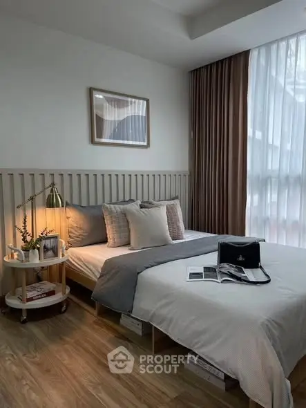 Cozy modern bedroom with stylish decor and natural light