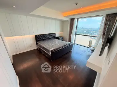 Luxurious bedroom with stunning city view and modern decor