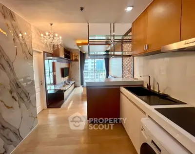 Luxurious modern kitchen with open layout and elegant living room view