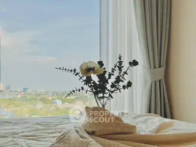 Luxurious bedroom with stunning city view and elegant decor