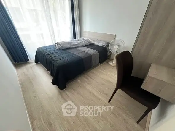 Modern bedroom with sleek design and natural light