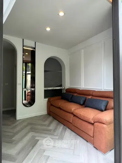 Stylish living room with modern design and cozy leather sofa