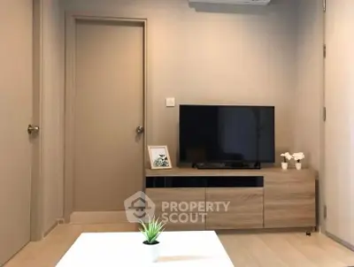 Modern living room with sleek TV stand and minimalist decor
