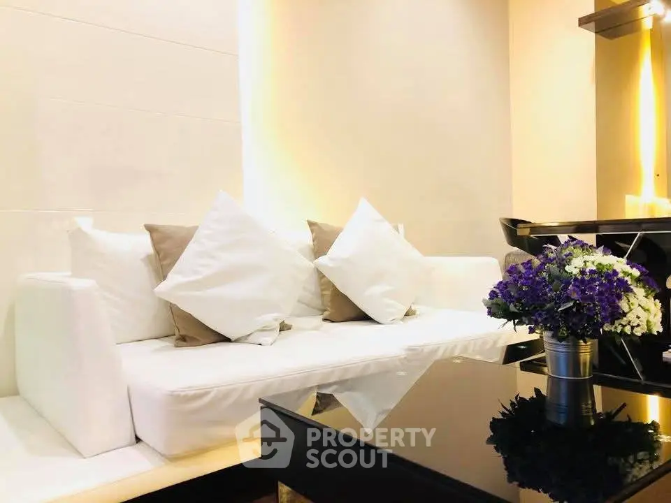 Elegant living room with modern white sofa and chic decor