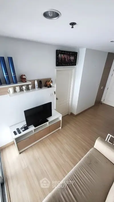 Modern living room with sleek TV setup and stylish decor