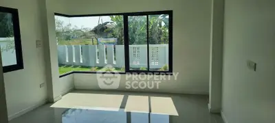 Bright corner unit with large windows and garden view, perfect for natural light lovers.