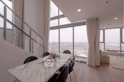 Luxurious high-rise apartment with stunning city view and elegant interior design.