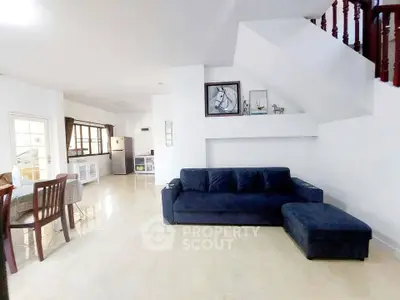 Spacious living room with modern furniture and open layout