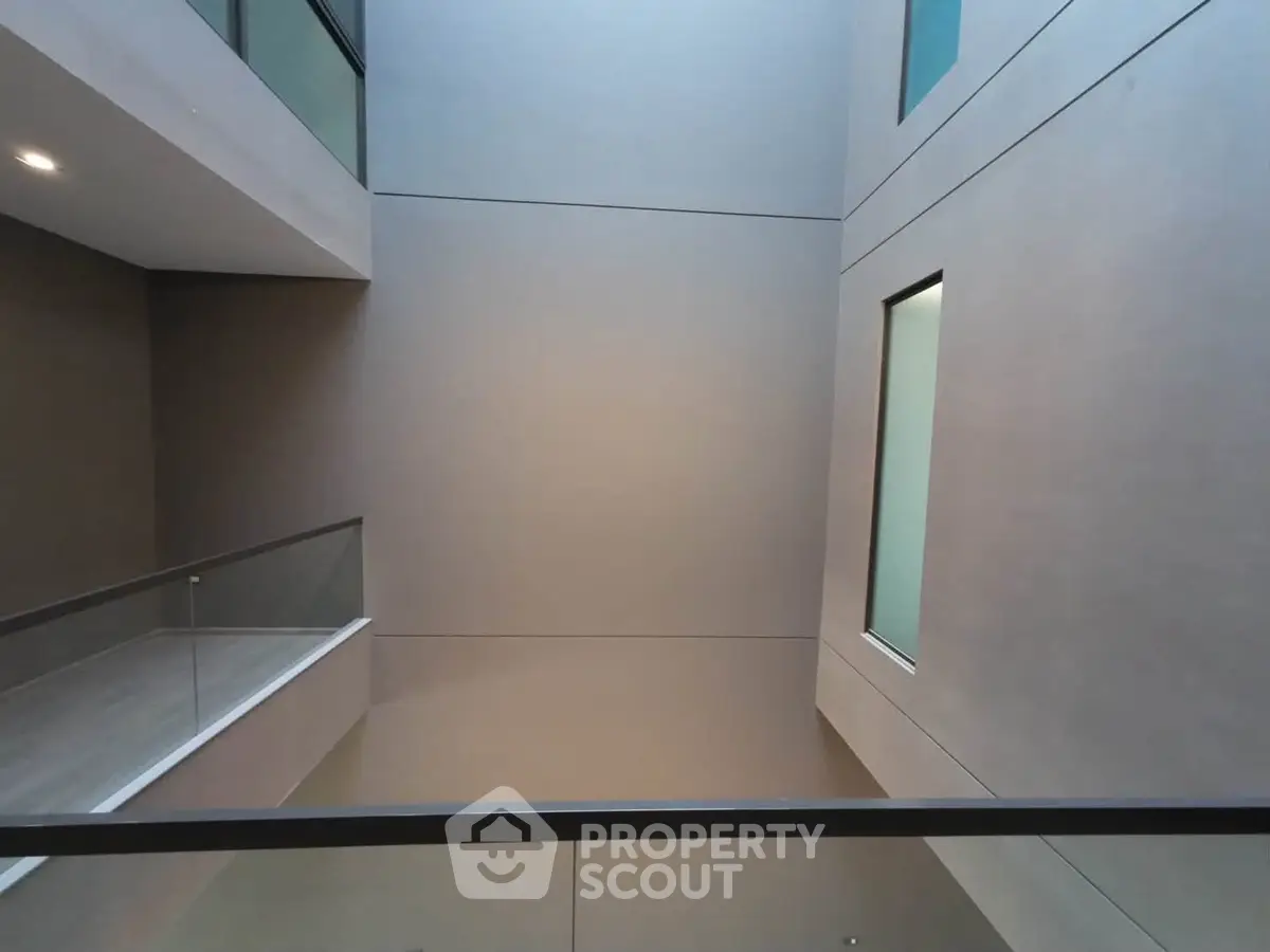 Modern building interior with sleek design and glass railings