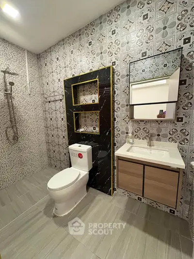 Modern bathroom with stylish tile design and sleek fixtures