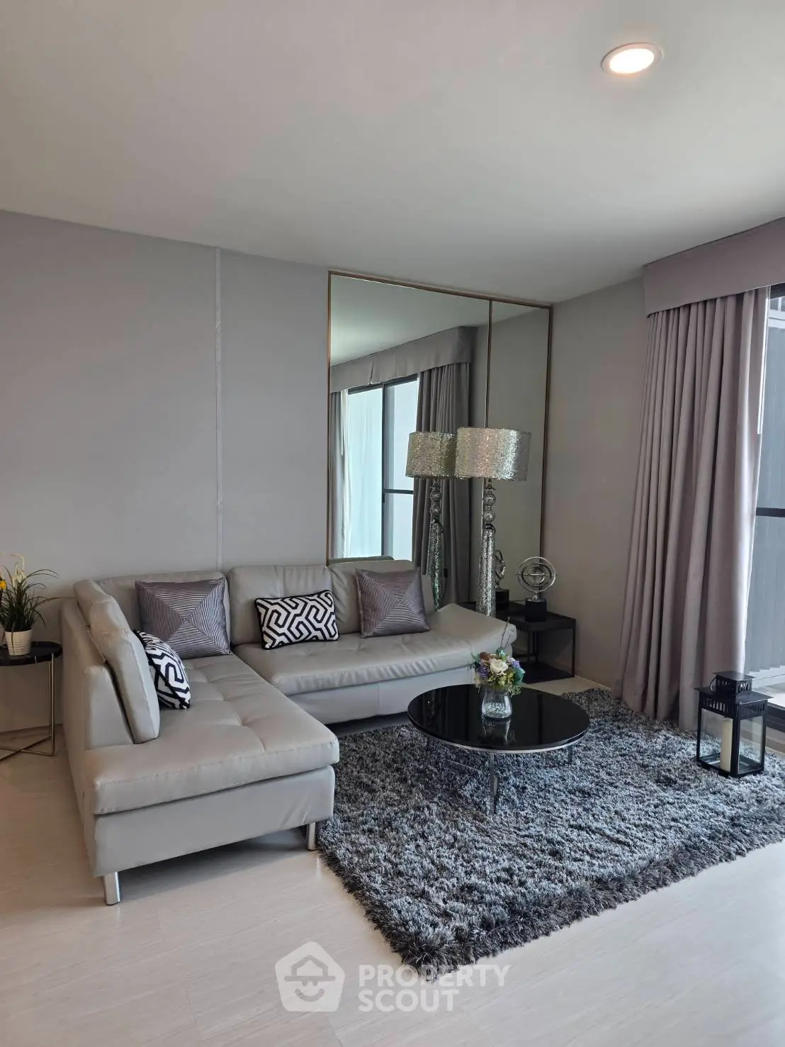 Modern living room with stylish decor and cozy seating area
