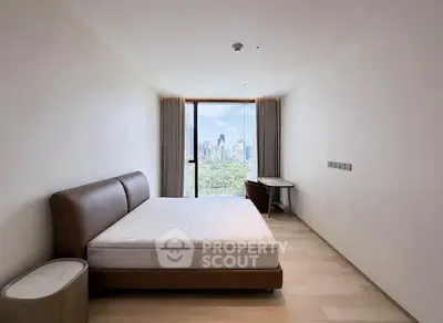 Spacious bedroom with city view and modern minimalist design