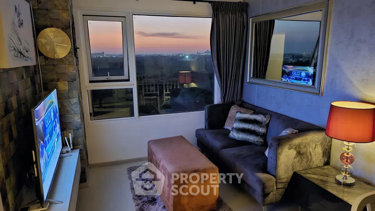 Cozy living room with sunset view, plush sofa, and modern decor