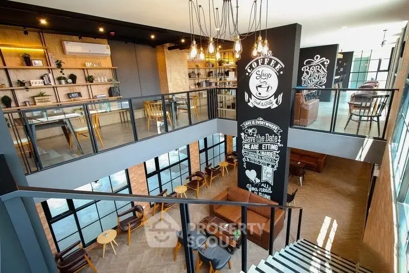 Modern co-working space with stylish decor and ample natural light