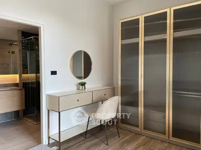 Modern bedroom with elegant wardrobe and stylish vanity area
