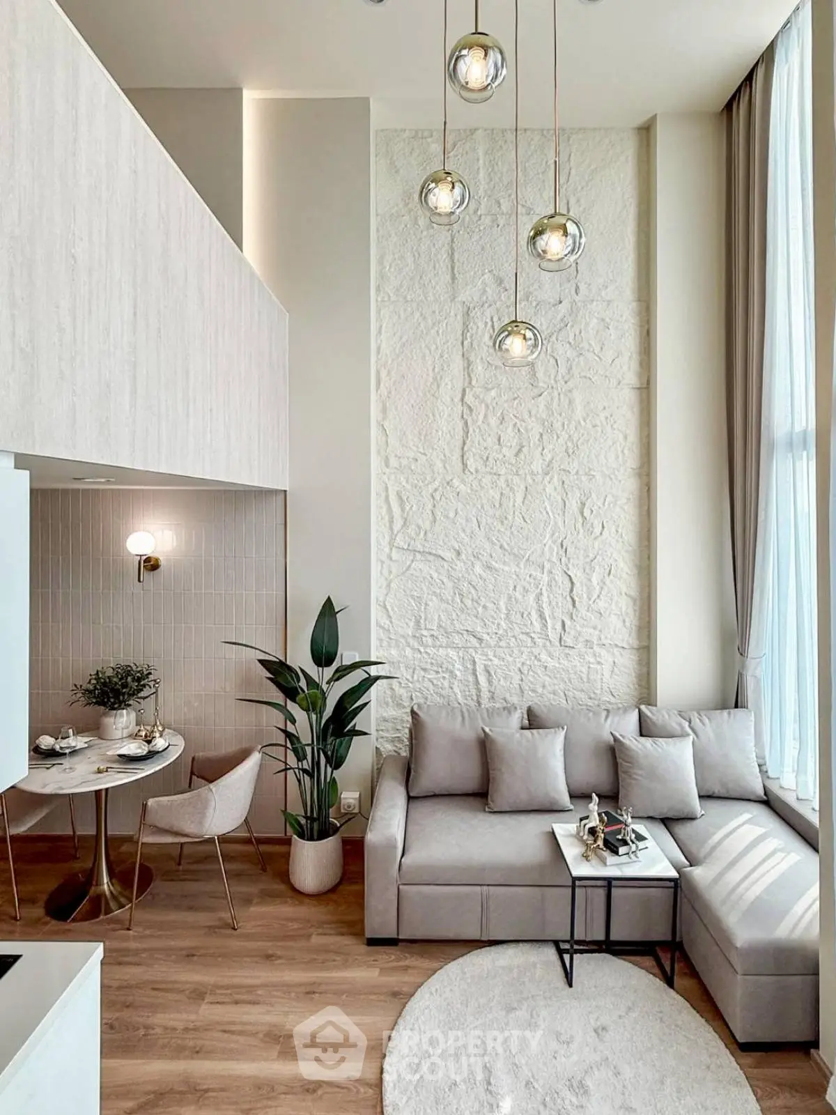 Modern living room with high ceiling and elegant decor