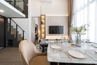 Modern living room with elegant dining area and stylish decor