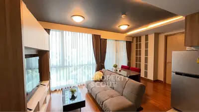 Modern living room with large windows and stylish furniture