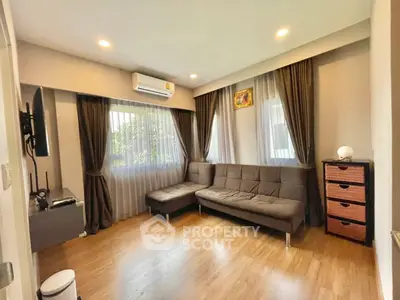 Modern living room with sleek furniture and natural light