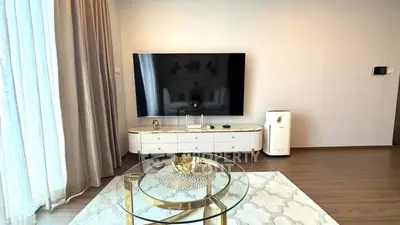 Modern living room with sleek TV setup and elegant decor