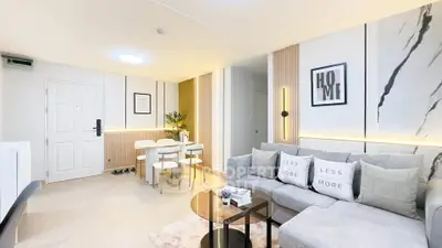Modern living room with stylish decor and cozy seating area