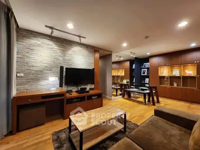 Spacious modern living room with stylish decor and wooden furniture