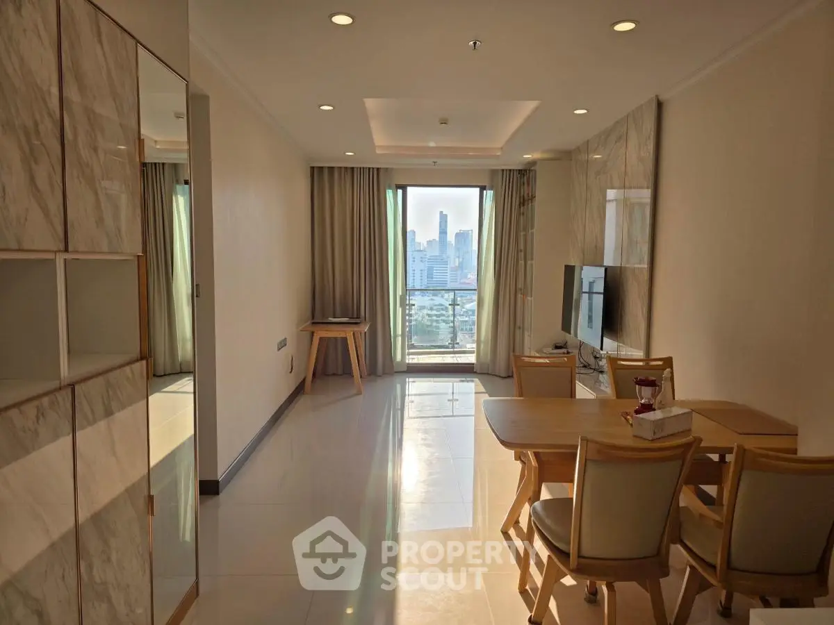 Modern living room with city view, elegant furniture, and natural light
