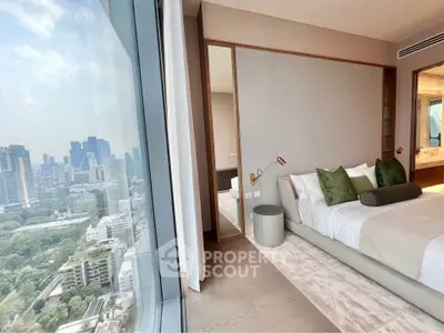 Luxurious bedroom with stunning city view in high-rise apartment