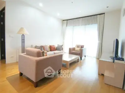 Spacious modern living room with elegant furniture and natural light