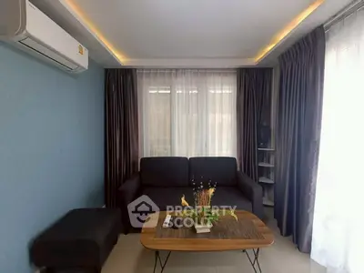 Cozy living room with modern decor and natural light