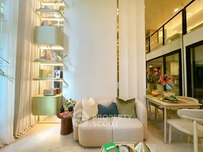 Luxurious modern living room with elegant decor and open layout, featuring stylish furniture and ambient lighting.