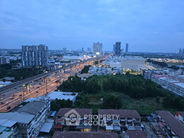 Stunning cityscape view from high-rise building showcasing urban skyline and vibrant city life.