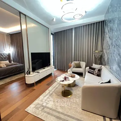 Luxurious living room with elegant decor and cozy bedroom view