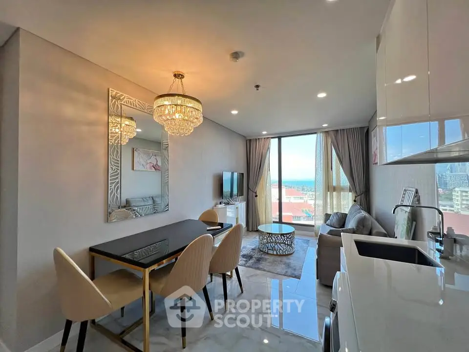 Luxurious modern living room with elegant chandelier and stunning city view